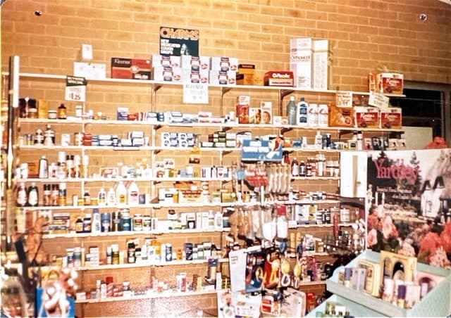 Shelves stocked with health and beauty products in the original Byford Pharmacy.